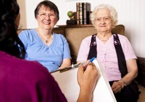 iStock_Senior-woman-daughter-caregiver in foreground-20801905_small